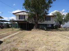  25 Acacia St Blackwater QLD 4717 LEASEHOLD LAND - LARGE KITCHEN DINING AREA - TILED FLOORING This three bedroom high set home has a large modern kitchen with plenty of bench and cupboard space for the busiest of households. The lounge room is huge with tiled flooring throughout these areas and to the hallway. The bathroom boasts a separate shower to the bath with glass door to the shower to contain any splashes, modern vanity unit, tiled flooring and large mirror to finish. The bedrooms are air conditioned with carpet flooring. Timber blinds and ceiling fans completes upstairs. Underneath has a separate laundry, a workshop / storage room, plus a semi enclosed area fantastic for entertaining or relaxing. Room for a car under and still plenty of room for storage. Leasehold Block! Inspections Inspections by appointment only. For Sale All offers to be received by COB Friday 20th Nov Features General Features Property Type: House Bedrooms: 3 Bathrooms: 1 Land Size: 741 m2 (approx) Indoor Toilets: 1 Air Conditioning Outdoor Carport Spaces: 1 Garage Spaces: 1 Other Features Tiled flooring throughout, Carpet to bedrooms, Ceiling fans 