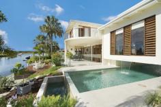  32 North Point Banksia Beach QLD 4507 $1,695,000 FIXED COMMISSION At Harriet Lee Property you know you are onto a winning formula. Of course not only do you save those valuable dollars with Harriet Lee's Fixed Commission, at $5850 +GST, you know you are working with a real property agent with a real passion for her clients property needs This imposing family home sits proudly on a large North Facing 1,021m2 block and boasts 20 metres of unobstructed waterfront. From the moment you enter through the 3.3 metre high pivot feature door you will be mesmerised by that water view. This home has been designed to embody everything the Queensland lifestyle offers and was once featured in “Queensland Homes”. Every space within this impressive home has been thoughtfully designed around water vistas.  Entertain family and friends all year round. With two alfresco dining areas you can choose to entertain by the pool or overlooking the canal. An elegant use of timber joinery and flooring is perfectly balanced against a clean white palette to create a sense of calm sophistication.  4.4 metre high ceilings over the living area provide the grandeur you expect from a property of this stature.  Quality of build and design is evident to all who enter and the astute buyer will not be disappointed. Features: Quality construction with a combination of core filled concrete block and commercial brick veneer, walls and ceilings insulated, first floor suspended concrete slab, comfort plus glazing Stunning 25 metre pool with rimless glass surround Huge foyer entry – see that mesmerising view as soon as you walk in Bright, open plan living and dining area with enviable views to the pool and canal 4.4 metre high ceiling to the living area provides further grandeur to the home Gourmet kitchen with quality Miele & Bosch appliances, including coffee machine, wine fridge, dishwasher, induction hob, water purification etc Boasting 4 bedrooms each featuring ensuite bathrooms, walk in robes, air conditioning and private north facing balconies with water views The master suite possesses an opulent ensuite with spa, two walk in robes and magnificent water and mountain views Energy efficient design with 5 star passive solar designs, solar power generation system, UPS battery power back up system and energy efficient Daikin VRV air conditioning Monitored Intruder Alarm System and Deltacom Intercom for front gate entry Dual electric hot water system depending on occupancy. Rainwater harvesting system including a 7,500 gallon underground cast tank and automatic water irrigation system Brisbane Airports approximately 40 minutes away Fit in a game of golf at the prestigious Pacific Harbour Golf and Country Club. Enjoy the sunsets over the Glass House Mountains.  Indulge in the luxurious and prestigious waterfront lifestyle this home offers. 