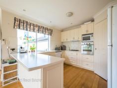  2/40 Burt Street Mount Clarence WA 6330 $599,000 THE LOOKOUT For Sale Home is a place where a large portion of your time is spent, time that is for relaxation and rejuvenation from your busy work lives, so it is important that your abode be a place of escape and full of pleasantries. This elegantly designed executive townhouse achieves just this, with a backdrop of the ocean to sooth and refresh, reminding you that some of the best things in life are free. Located towards the rear of the high class community which itself is tucked away within a cul de sac, the peace and quiet is pure bliss to accompany the view. A private double remote garage and paved additional guest parking area as well as nicely manicured gardens greet you as you approach the home. Textured cream render creates a regal feel as the grand two story structure towers above you, impressing with its stature and classy minimalistic style. Stepping inside via the white entrance doors, a bright and sizable entrance hall creates leading lines to the solid wood feature staircase, as well as into the multi-tiered lower level bedroom wings and conveniences. The first port of call is the spacious master bedroom, with triple awning windows, walk in robes for him and her either side of the ensuite entrance, and the ensuite itself which features marble look tiles, a glass shower, crisp white vanity and toilet. Steps lead up from the entrance hall to the separate hallway with its own door that introduces the minor bedroom wing. Within it is the second bathroom, family sized and featuring a luxurious two person raised spa bath, the perfect tonic for any aches and pains (glass of vino in hand, of course!). It also features a recess shower, vanity and its own skylight amongst bright, neutral tones. Each of the three minor bedrooms are generously proportioned, featuring build in robes and awning windows to control that beautiful afternoon breeze. Another set of steps from the entrance hall leads downwards to additional walk in storage, garage access and a laundry of epic proportions including plenty of room for additional fridge and freezer space and its own laundry chute from upstairs. Ascending the homes main feature staircase, you then experience that wow factor element of the home. As you reach the top, a huge open plan family living area and kitchen opens out in front of you. Well, we think it does... We were too distracted by the panoramic millionaire's views of Middleton Beach and the Harbour to notice!! A full wall of windows makes sure that this is capitalised on to its full extent. Double French doors lead through into a formal lounge room, floating floorboards create a warm and modern feel, and the spacious kitchen has all of the storage, bench space, breakfast bar room and modern stainless steel appliances you could ever need. Air conditioning keeps the air toasty or cool, depending on the season, while elegant curtains provide privacy if you desire. You even have your own petit sheltered al fresco deck just beside the kitchen including a private wire balustrade stairway down to the main yard. The homes yard is spacious enough to enjoy, yet not too hefty that maintenance becomes overwhelming. Surrounded by rendered fencing, it's a private little possie to be enjoyed. Make home your escape in this townhouse just made for busy lives. The occupants have now vacated and the home is ready for you to move in. What you should know:  - High class executive townhouse  - Exceptional Middleton Beach views  - Proximity to schools and town  - Compact yet effective yard  - Private double garaging  - Zoned Residential Sale Details $599,000 Features General Features Property Type: Townhouse Bedrooms: 4 Bathrooms: 2 Land Size: 597 m2 (approx) Indoor Ensuite: 1 Toilets: 2 Indoor Spa Built in Wardrobes Split system Air Conditioning Air Conditioning Outdoor Garage Spaces: 2 Inspections Inspections by appointment only. 