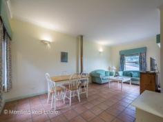  5/21 Adelaide Crescent Middleton Beach WA 6330 $360,000 RETREAT AND REMINISCE For Sale As a child, most of us would have experienced the delight of holding a seashell up to our ear and hearing the ocean, no matter where we were. In this incredible holiday unit, you don't need the seashell to experience this phenomenon, with the blissful sound of the waves forming a constant soundtrack to your lives. This perk is born from the fact that the unit is located just moments away from the iconic Middleton Beach, making your stay in the unit a very rewarding one indeed. As an investment, these units have always been in hot demand due to the perk of being able to occupy the place for a few months of the year to benefit from its location and charming style, while gaining an income from it for the rest of the year- it's a win-win. Located within a peaceful, French styled complex, the approach to the unit is graced with manicured gardens and rose bushes, charming from the first impression. At the front of the unit is an exclusive front carport, while extra guest parking can be found nearby.  Step up to the shaded front veranda, with a mini outdoor setting that can admire the surrounds on a quiet afternoon when you are not off making the most of the beach or the sights of Albany. Stepping inside, you are welcomed into the semi open plan lounge room of the home, cosy, homely and adorned with soft decor tones and terracotta tiled to give it a light and airy but slightly European feel. The homes kitchen is slightly tucked away and features all of the space and style you need to make holiday living easy!  An upright oven and stove combined with extensive bench and storage space, a separate pantry and a window that gazes out to the charming external courtyard space. Double glass doors from the dining room provide access to the outdoor area which is perfect for enjoying a platter of cheese and accompaniments, and a glass of wine foraged from the Great Southern's food trail.  A nicely tucked away laundry portico also features in the downstairs section. A carpeted staircase leads up to the homes two generous queen sized bedrooms, each featuring a large windows that overlooks the garden courtyard of the complex, again channelling a European village feel. Placed between them is the unit's bathroom which features a glass corner shower, storage vanity and toilet amongst light bright tones. Now you have explored the home, let's explore the surrounds- starting with the charming cafe that lies at the entrance of the complex, the gourmet cafe and deli and wine bar that are just a few steps away, and the quaint little gift shop where you can acquire beautiful little finds after a hard days relaxing. Continuing further, the Middleton Beach hub features two more bars and restaurants, stunning walk and bike trails, playgrounds and of course, the unbeatable white sand and crystal water of the beach itself.  An investment that offers no hassle professional management, you can be as relaxed throughout the year as you are when you are making the most of the home for your holidays! What you should know: -Stylish and homely holiday unit  -Located within professionally managed complex  -Moments from beach, bars, restaurants and trails  -Spacious open plan living and second story bedrooms  -Private parking and guest parking Sale Details $360,000 Features General Features Property Type: Townhouse Bedrooms: 2 Bathrooms: 1 Indoor Toilets: 1 Built in Wardrobes Open Fireplace Outdoor Secure Parking Carport Spaces: 1 Courtyard Outdoor Entertaining Area Inspections Inspections by appointment only. 