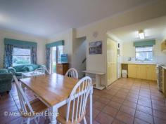  5/21 Adelaide Crescent Middleton Beach WA 6330 $360,000 RETREAT AND REMINISCE For Sale As a child, most of us would have experienced the delight of holding a seashell up to our ear and hearing the ocean, no matter where we were. In this incredible holiday unit, you don't need the seashell to experience this phenomenon, with the blissful sound of the waves forming a constant soundtrack to your lives. This perk is born from the fact that the unit is located just moments away from the iconic Middleton Beach, making your stay in the unit a very rewarding one indeed. As an investment, these units have always been in hot demand due to the perk of being able to occupy the place for a few months of the year to benefit from its location and charming style, while gaining an income from it for the rest of the year- it's a win-win. Located within a peaceful, French styled complex, the approach to the unit is graced with manicured gardens and rose bushes, charming from the first impression. At the front of the unit is an exclusive front carport, while extra guest parking can be found nearby.  Step up to the shaded front veranda, with a mini outdoor setting that can admire the surrounds on a quiet afternoon when you are not off making the most of the beach or the sights of Albany. Stepping inside, you are welcomed into the semi open plan lounge room of the home, cosy, homely and adorned with soft decor tones and terracotta tiled to give it a light and airy but slightly European feel. The homes kitchen is slightly tucked away and features all of the space and style you need to make holiday living easy!  An upright oven and stove combined with extensive bench and storage space, a separate pantry and a window that gazes out to the charming external courtyard space. Double glass doors from the dining room provide access to the outdoor area which is perfect for enjoying a platter of cheese and accompaniments, and a glass of wine foraged from the Great Southern's food trail.  A nicely tucked away laundry portico also features in the downstairs section. A carpeted staircase leads up to the homes two generous queen sized bedrooms, each featuring a large windows that overlooks the garden courtyard of the complex, again channelling a European village feel. Placed between them is the unit's bathroom which features a glass corner shower, storage vanity and toilet amongst light bright tones. Now you have explored the home, let's explore the surrounds- starting with the charming cafe that lies at the entrance of the complex, the gourmet cafe and deli and wine bar that are just a few steps away, and the quaint little gift shop where you can acquire beautiful little finds after a hard days relaxing. Continuing further, the Middleton Beach hub features two more bars and restaurants, stunning walk and bike trails, playgrounds and of course, the unbeatable white sand and crystal water of the beach itself.  An investment that offers no hassle professional management, you can be as relaxed throughout the year as you are when you are making the most of the home for your holidays! What you should know: -Stylish and homely holiday unit  -Located within professionally managed complex  -Moments from beach, bars, restaurants and trails  -Spacious open plan living and second story bedrooms  -Private parking and guest parking Sale Details $360,000 Features General Features Property Type: Townhouse Bedrooms: 2 Bathrooms: 1 Indoor Toilets: 1 Built in Wardrobes Open Fireplace Outdoor Secure Parking Carport Spaces: 1 Courtyard Outdoor Entertaining Area Inspections Inspections by appointment only. 