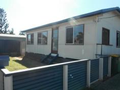  91 Cordingley St Yeppoon QLD 4703 $270,000 Lowset property in Yeppoon with loads of Potential !!!!!!!!!!!!!!!!!!!! * 3 bedrooms with near new carpet  *Tidy kitchen,dining, lounge room all have tiled flooring.  *This property has just had a new roof and was painted internally in 2014  * Fully fenced yard.  * Plenty of room for swimming pool or shed.  * Located short distance to shopping centres/ primary and secondary schools and the Beach  * Great tenant in place paying $270 per week For Sale $270,000 Features General Features Property Type: House Bedrooms: 3 Bathrooms: 1 Land Size: 620 m2 (approx) Indoor Toilets: 1 Air Conditioning Outdoor Garage Spaces: 1 Other Features Close to Schools, Close to Shops, Close to Transport, Garden, Polished Timber Floor Inspections Inspections by appointment only. 