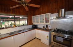  472 Veresdale Scrub School Rd Veresdale Scrub QLD 4285 $550,000 Negotiable WIDE OPEN SPACES AND LOADS OF ROOM WITHIN 5 BEAUTIFUL ACRES. Ideal property for those seeking peaceful living with country views. This outstanding offering to market features an elevated block with a contemporary style home. Designed to maximise the benefits of the property this home includes an Open Plan Living with sunken lounge and cathedral ceilings.The kitchen is fully functional with Freestanding Stainless Steel Cooker, dishwasher and breakfast bench. A sunken lounge takes advantage of the views to the country surrounds and hills beyond with access to the front veranda. The home boasts four bedrooms all with built-in robes, each bedroom is substantial in size with an ensuite and walk-in robe to the Master. Downstairs another living area provides room for children or an additional study area with a large storage room behind. Outdoor entertaining is easily accommodated with paved patio - BBQ area and above ground Pool. A fully self-contained Granny Flat gives living options for visiting relatives or grown up children desiring some privacy. The property includes a 12 x 6m Colourbond Shed for machinery, cars or storage..Complete with two paddocks and plenty of room for pets and children, this property offers a lifestyle choice not readily available to many.   Above Ground Pool, Balcony, Broadband, Built In Robes, Courtyard, Deck, Dishwasher, Ensuite, Floorboards, Fully Fenced, Grey Water System, Open Spaces, Outdoor Entertaining, Pay TV, Rumpus Room, Secure Parking, Shed, Solar Hot Water, Split System AirCon, Water Tank, Workshop, PROPERTY DETAILS Price $550,000 Negotiable Property Type House Property ID 2950411 4 2 5 