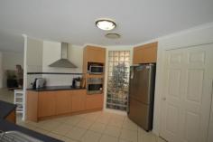  21-23 Cherry Tree Court Canungra QLD 4275 $699,000.00 Negotiable "SURE TO IMPRESS" All that you have ever dreamed of is here in this magnificent; 371m2 four bedroom home, all with built in robes, the master with a large walk-in and ensuite. The Architect designed home has been especially cherished by the current owners, with almost four acres of beautifully maintained and manicured gardens with a large Dam & pump that irrigates the gardens, with a separate huge area for growing Organic Vegetables, with mature trees giving sufficient shade for those warm summer days, yet open enough to enjoy the clear moon and starlight evenings, this is a property you must inspect! When you walk through the double front doors into the entrance Foyer of this spacious home with fully tiled floors to all living areas, the open plan home has been designed as an entertainer, with open plan kitchen with island benches, with a dish washer, a large dining area / sunroom that overlooks the 10 X 6 mtr salt chlorinated in ground pool and large undercover entertainment area.  A Double Garage with remote controlled doors. Plus a separate 6X6 mtr Colourbond Double garage, and a detached cubby house or office. This property is situated in the Gold Coast Hinterland a short 5 minute drive from the popular Country Town of Canungra, which is a comfortable 20 minute drive to Nerang & the Pacific Hwy.   Broadband, Built In Robes, Courtyard, Dishwasher, Ducted Cooling, Ducted Heating, Ensuite, Fully Fenced, Grey Water System, In Ground Pool, Open Spaces, Outdoor Entertaining, Pay TV, Secure Parking, Shed, Solar Hot Water, Solar Panels, Water Tank, Workshop, PROPERTY DETAILS Price $699,000.00 Negotiable Property Type House Land Size 1.5900 Hectares Property ID 2956523 4 2 4 