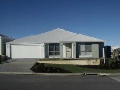  26 Cosmia Grove Jindalee WA 6036 $469,000 ONE OF THE BEST VALUED HOMES IN EDEN BEACH! CALL TODAY FOR YOUR PRIVATE APPOINTMENT! ! Bedrooms 4  Bathrooms 2  Car Spaces 2   It's all done just move straight into this value packed probably best priced 4x2 in Eden Beach, Brand Spanking New. Matilda Bay design home by First Home Buyers Direct. Looking for your first home or Investment? Brand New built 4x2 family home with low maintenance in mind so you can enjoy this beach side home adjacent to a park & within easy access to all amenities & Butler's new train station.  All the extras have been added from air-con, tiled flooring to the entrance hall & living area's, carpets, down lights & the extended upon paved Alfresco. With a welcoming entrance hall that passes the enclosed Theatre room, master bedroom with deep W.I.R. & master en-suite with his/hers vanities before opening up onto the Kitchen/Family/Meals area. Off the inner hallway three double bedrooms all with B.I.R. & activity between Bed 3/4 giving those kids there own PlayStation or study area. A family bathroom suite, separate W.C. & spacious laundry further compliment this home. Outside an extended paved alfresco with ceiling fan, a double remote garage with shoppers entrance leads into a floor to ceiling triple width mirror hallway securing ample storage linen space. Love this home to secure a private viewing prior to the home open call; Mayfair Property Services 9562 7551 or Jordan Newton 0433 933 395. Property Details Bedrooms 		 4 Bathrooms 		 2 Garages 		 2 Land Area 		 315 m2 Floor Area 		 201 m2 
