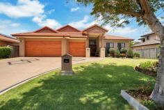  3 Pearwood Ln Robina QLD 4226 $775,000 Awesome Entertainer - Big On Size, Small On Work! Maximise your family, fun and relaxation time in this beautiful home designed with the gourmet entertainer in mind. More play, less work here!! Nothing to do but move in, enjoy and proudly share your new home with family and friends. Located in the popular and well regarded community of 'The Groves', surrounded by quality homes & house proud neighbours, close to Robina Town Centre and Easy T shopping and restaurant precinct, this delightful home will definitely not disappoint! Quality built in 2003, this home has many inclusions and ticks many boxes. Solar power plus insulation means it is almost free to run, manicured easy maintenance gardens, paved surrounds, ducted vacuum, epoxy floor in garage, multiple TV points, storage 'a go-go', plumbed fridge space, you name it, it probably has it!! Motivated Sellers have purchased elsewhere and have priced this sensational home to sell quickly ..... step up now, or miss out! This one won't last long!  * 4 bedrooms, 2 bathrooms * Separate living areas * Formal dining or pool room * Central entertainer's kitchen * Stone bench tops throughout * High ceilings, quality fixtures & fittings * Durable timber finish flooring * Under roof outdoor entertaining * Fenced in ground pool; Safety Certificate! * Manicured, easy maintenance grounds * Triple lock up garages plus off street * Many inclusions, plenty of storage * MOTIVATED SELLERS; COMPETITIVELY PRICED 