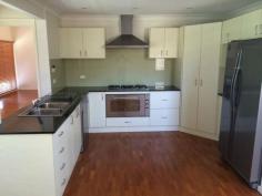  25 Tennant Pl Illawong NSW 2234 $830 per week Be quick to inspect this huge split level family home located in a very convenient location with close proximity to schools, shops and transport. Features Include: 4 good sized bedrooms with build ins (main with en-suite) Formal Lounge with Soaring Cathedral Ceilings plus air conditioning Modern kitchen with Stainless Steel appliances and gas  Multiple Living areas and separate dining room Large covered decking area with private oasis outlook Internal Laundry Balcony views located opposite a bush reserve Double lock up garage with internal access Contact the office today to arrange an inspection or Contact Rabie Chehade on 0409 006 900 Property Details Bedrooms 		 4 Bathrooms 		 3 Garages 		 2 