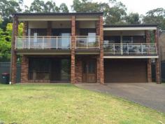  25 Tennant Pl Illawong NSW 2234 $830 per week Be quick to inspect this huge split level family home located in a very convenient location with close proximity to schools, shops and transport. Features Include: 4 good sized bedrooms with build ins (main with en-suite) Formal Lounge with Soaring Cathedral Ceilings plus air conditioning Modern kitchen with Stainless Steel appliances and gas  Multiple Living areas and separate dining room Large covered decking area with private oasis outlook Internal Laundry Balcony views located opposite a bush reserve Double lock up garage with internal access Contact the office today to arrange an inspection or Contact Rabie Chehade on 0409 006 900 Property Details Bedrooms 		 4 Bathrooms 		 3 Garages 		 2 