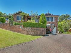  10 Brantwood Cl Lakelands NSW 2282 $590,000 Desirable Lakelands Location This spacious classic style 4 bedroom family residence positioned in popular Lakelands boasts district & mountain views from its special position at the top of the peaceful cul- de -sac setting. - Four bedrooms offer built in robes. The fourth is currently used as a study.  - Recent white tiling features throughout hallways & the two casual living areas.  - A spacious formal lounge room allows for a generous dining room at one end making for easy entertaining .  - Double blinds feature throughout most of the home.  - The large open tiled kitchen offers plentiful storage & breakfast bar with the family area, flowing out to the alfresco entertainers timber deck.  - There is a new ensuite for the parents plus a large light filled main bathroom for the family next to the bedrooms.  - The laundry is well placed on the main level & features a bench & plenty of cupboards.  - Downstairs you will find a tiled second casual living area or teen retreat with sliding doors to a paved undercover area.  - A double garage offers internal access.  - The delightful family friendly, grassed private yard offers the bonus of dual access from the top side of the street.  - Just minutes from the lake, amenities & zoned for excellent schools, this quality family home needs to be on your must see list. For Sale Best Offer Over $590,000 Features General Features Property Type: House Bedrooms: 4 Bathrooms: 2 Land Size: 809 m2 (approx) Outdoor Garage Spaces: 2 Inspections Sat, 12 Dec 01:30 PM - 02:00 PM 