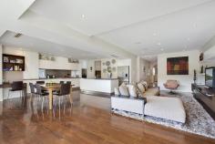  64 Balfour Rd Bellevue Hill NSW 2023 A sophisticated contemporary residence of timeless appeal, this freestanding home's free-flowing living spaces, lush resort-style gardens and exceptional finishes create the perfect environment for family living and entertaining. Built to discerning standards, this luxurious two-storey home is in a blue-ribbon setting on the fringe of Plumer Road village, a short stroll to the harbour foreshore, parkland and acclaimed waterfront dining. Secluded from the street behind a tropical foregarden and driveway, this impeccably appointed family haven is set on a private, level 619sqm block with double garaging and a huge basement. - Classical contemporary luxury with travertine entry - 4 large bedrooms with built-in robes, 3 with ensuites - Private master with dressing room, designer bathrooms - Perfect home office or study - Elegant formal rooms, high ceilings, free-flowing layout - Custom entertainer's island kitchen with butler's pantry - Huge open casual living area, walnut hardwood floors - Large internal laundry, ducted vacuum system, security alarm and intercom - Seamless flow to an entertaining terrace with day bed - Idyllic child-friendly garden, lush lawn and heated pool - Outdoor shower, poolside deck, powder room, storage - Custom joinery, ducted air, underfloor heating in baths - Internal access to an auto Double lock up garage plus basement storage room 