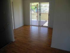  12 Hickman St Bororen QLD 4678 $285,000 HOME IN WHISPER QUIET TOWN Located on a 1,142m2 block this lovely 3 bedroom property is in a fantastic condition. Situated in the whisper quiet country town of Bororen, this is only 20 mins south of Tannum Sands/Boyne Island and 35mins to Gladstone. FEATURES: *Modern kitchen with ample cupboard & bench space *Vinyl timber look floors in living & dining area create easy maintenance throughout *Spacious lounge room now with new air conditioner installed *Master bedroom with air conditioning and built in robe *Remaining 2 bedrooms are fitted with ceiling fans & built in robes *Modern bathroom & huge laundry with striking dark floor tiles *Private spacious timber deck adjoined to the house perfect to enjoy those warm days or the cool evenings *Single lock up garage and fenced yard There is loads of extra land space to build a shed of your dreams or park a van or boat  This is a very well looked after home with nothing to do except move in. School bus pick available to Tannum Sands schools or short walk to Bororen Primary school. Walk to local shops and conveniences. Property Amenities & Features General: Reference: 926 Category: House Bedrooms: 3 Bathrooms: 1 Parking: 1 Land Area: 1142 squareMeter Features: Air Conditioning,Garage,Heating,Lifestyle,Value,Electric Hot Water,Air Conditioned,Built In Robes,Close to Schools,Entertaining Area,Established Gardens,Fenced Ba 