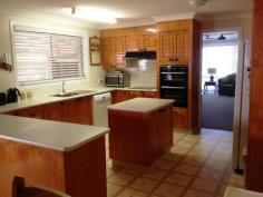  44 Ugoa St Narrabri NSW 2390 $445,000  With an established front garden with parking, a secluded undercover front verandah overlooks the Narrabri Lake. •This solid three bedroom brick home with steel frame comprises of quality, comfort and style. The property is fully insulated and has evaporative air-conditioning throughout. •All the bedrooms have new carpets, ceiling fans and two of the three bedrooms have built-ins. All the windows have been dressed with new timber venetian blinds. •A spacious formal lounge with gas outlet and ceiling fans is perfect for family gatherings. •The kitchen and eat in dining area with vinyl flooring forms the central hub of the home. The kitchen is well equipped with a dishwasher, new wall oven and new electric stovetop with a central island bench and plenty of storage space. There is direct access from the carport to the kitchen.  •The family three-way bathroom has been recently renovated and comprises of a shower, separate vanity and toilet.  •The modern tiled laundry has plenty of storage and has direct external access with wheelchair access. •A second family room with new carpeting, combustion wood fire place, surround sound and ceiling fan overlooks the large undercover concrete barbeque alfresco area with ceiling fans and undercover cloths line.  •Driveway with remote roller door access, leads to an undercover concrete carport which can accommodate up to 4 cars and a single lock-up garage with roller door, shelving and power.  •Behind the garage a separate granny flat with a split-system and bathroom.  •The well maintained backyard comes with rainwater tanks which are linked to the hot water system. •This is the perfect home to entertain whilst still having all the comforts with style. With street appeal in an established area this quality home set on a 753sqm block will leave a lasting impression of style, quality and value. Property Details Property Type: 	 House Bedrooms: 	 4 Bathrooms: 	 2 Garages: 	 1 Land Area: 	 753m2 