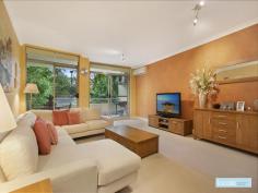  33/1 Kings Bay Avenue Five Dock NSW 2046 Beautifully presented with a leafy outlook, this spacious two bedroom apartment is ideally located close to shops, cafes and public transport. This modern apartment has a flexible floor plan, entrance hall, open plan living area leading onto a treescaped balcony, sleek galley style kitchen with Smeg appliances and stone benchtops, separate dining or home office area with private balcony, stylish bathroom, two bedrooms main with ensuite and both with built in robes. Other features include, internal laundry, air conditioning, secure single lock up garage, access to pool, gym and bbq/play area, all very inviting for easy living. Large open plan living area that opens out onto a large balcony Separate dining area or home office with private 2nd balcony  2 large tiled bathrooms with separate bath & shower Generous balcony for relaxed BBQ's & outdoor dining Galley granite gas kitchen with stainless steel appliances Second small balcony off the kitchen creating cross ventilation Tranquil position on the first floor Resort style facilities that includes pool & gym  Easy access to a secure single lock up garage Leisurely stroll to Five Dock village, parks & Canada Bay foreshores TOTAL AREA 125sqm Strata $1,524 p/q, Council $259 p/q, Water $178 p/q 