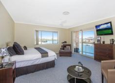  18 Bosun Blvd Banora Point NSW 2486 $1,249,000 OXLEY COVE - SERIOUS BOATIES DEEPWATER POSITION Be boating, skiing and fishing within 2 minutes in the beautiful main Tweed River with no speed restrictions and easy ocean access. The large entertaining home with outdoor covered entertaining area and BBQ patio sits on a spacious 846m2 corner lot with 27m frontage to deep water and sandy beach. Side access to back the ski boat down to the concrete boat ramp. The pontoon can hold a 40-50 ft craft. Live the dream at below replacement cost if you could get a vacant lot that is. - Infinity wet edge in-ground pool - Water views from living areas, kitchen + large main bedroom - Gourmet kitchen with granite bench-tops - Ducted air conditioning - Solar hot water - Security system - Room to park extra vehicles - Fully fenced front yard - High ceilings - Study Price 	 $1,249,000 Suburb 	 Banora Point Region 	 Northern Rivers Postcode 	 2486 Property Type 	 House Sale 	 Private Treaty Bedrooms 	 5 Bathrooms 	 3 Carspaces 	 2 Land Size 	 846 m2 