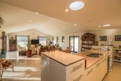  6 Eiger Ct Grindelwald TAS 7277 $539,000 - $569,000 Contemporary Home Private location beds 4  |  baths 2  |  cars 7 For Sale  Price: $539,000 - $569,000 Living is easy in this impressive, generously proportioned 4 bedroom home in the high end community of Grindelwald. Built in 2010, and sitting high on a spacious 4.2 acres, every detail has been carefully selected and quality crafted. Highlights include double-glazed windows throughout, Daikin reverse cycle air conditioner providing a luxuriously warm home in winter, and a gloriously cool home in summer and 8 solar panels providing affordable heating and cooling. Also helping to keep this large family home comfortable year round is high spec wall and roof insulation, fly screens fitted to all windows and most doors, and under floor heated bathroom and en suite floors and heated towel rails. The luxuriously appointed master bedroom suite boasts a hotel-style en suite and enough space to accommodate a parent retreat area, whist taking in views from all windows of the natural bush setting. The expansive open plan living and dining area has a beautifully appointed vaulted ceiling, and at the other end the luxury kitchen boasts granite bench tops, a large island bench, and quality Omega wall oven, dishwasher, ceramic cook top and range hood. The main bathroom with separate bath, shower and toilet sits conveniently between two spacious bedrooms that are positioned at opposite ends of the home from the master bedroom giving privacy for kids and parents alike. Just off the living room is the alfresco dining BBQ area, with plenty of undercover space that takes in the natural bush setting and tranquillity of the property. Secure parking and workshop space has been fully considered with this property. There is a brick double garage / workshop separate to the home as well as a single garage with internal access under the roof line. For those requiring even more house space, there are council approved plans ready to go for a granny unit or teenage retreat, or even separate guest quarters. Concrete paths surround this beautifully appointed home and this, together with an expansive alfresco and separate patio area will entice you outdoors to take in the views of the surrounding hills and the village of this beautiful Grindelwald area. Property Overview Property ID: 1P6449 Property Type: House Land Size: 17400m² (approx) Building Size: 240 m² (approx) Lounge Rooms: 1 Toilets: 2 Garage: 3 Car Space: 4 Construction: Brick Features: Air Conditioning Area Views Built-In Wardrobes Ensuite Garden 