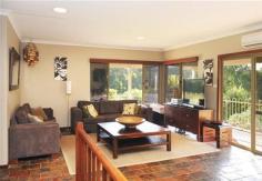  36 Mansfield Ave Margaret River WA 6285 $869,000 Elegant Country Home 4 3 4,180 sqm (approx) With views overlooking Yalgardup Brook and framed by a back drop of majestic native forest, peace and tranquillity are assured. This substantial family home situated in exclusive Basildene Estate has all the ingredients that make up an enviable Margaret River lifestyle. Accommodation includes 4 bedrooms, 3 bathrooms and 3 spacious sun filled living areas, a great choice of entertaining areas indoors and balconies and patios outdoors. The house is elevated and framed by established gardens and overlooks expansive lawn areas, with the lot being 4108m2 there is plenty of room to play. A 90m2 shed is there to house the cars and toys! Property Type House  Property ID 11049123526  Street Address 36 Mansfield Avenue  Suburb Margaret River  Postcode 6285  Price $869,000  Land Area 4,180 sqm (approx) 