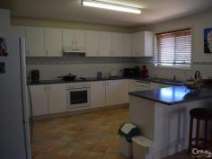  12 Farrer St Parkes NSW 2870 $365,000 SPACIOUS FAMILY LIVING! You'll get an instant welcoming feel when you enter this open planned four(4) bedroom brick veneer home. Just a decade young, this fresh modern home boasts a laid back, stress free lifestyle.  - Main bedroom has walk-in robe & en-suite with built-in robes in the other three.  - Generous open plan kitchen/dining/living zone  - Immaculate family bathroom  - Double lock-up garage with internal access via laundry  - Ducted evaporative a/c & natural gas heating  - Elegant covered entertaining area  - Manicured established gardens & secure backyard  All you need to do is unpack, relax and enjoy!  For more details or to arrange your inspection, contact our eager Sales Team. ID: 349283 Council Rates: $1,863.09 Land Area: 720 m² Zoning: R1 