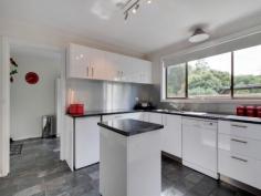  8 Charles St Cygnet TAS 7112 $380,000 Large Home, Walk to Everything! This large, 4 bedroom family home provides a lasting impression upon inspection. Light, open and airy with views over the established gardens, this is the ideal setting to raise a family, located just moments from schools, shops and sporting facilities. The living and dining areas are open plan and spacious, flooding with light and warmed by your choice of wood heater or reverse cycle. The kitchen was very recently upgraded to provide a clean, modern look and slate tiles have been placed through the high traffic areas. The home comprises of 4 very spacious bedrooms as well as a rumpus room that doubles as a second living. There is an office / storage area that leads to the rear garden which could become something more substantial should you require more space. The grounds are fenced and have been meticulously maintained over the years, with a creek along the rear boundary adding to the overall package. The covered entertaining in the back allows you to soak in the Northerly aspect which also offers all day sun throughout the interior.  There is a paved path to the local primary school and right into the heart of Cygnet which means access to the township is a breeze. An inspection of this well established family home is sure to delight, phone to organise your personal showing today. For Sale $380,000 Features General Features Property Type: House Bedrooms: 4 Bathrooms: 1 Land Size: 1086 m2 (approx) Outdoor Carport Spaces: 1 Inspections Inspections by appointment only. 