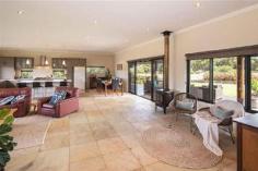  293 Stevens Rd Witchcliffe WA 6286 $1,595,000 Luxurious Estate 4 3 16 15 acre (approx) This magnificent homestead is set on 14 acres of undulating parkland right in the heart of the Margaret River wine region.  The custom designed home makes the most of the north facing aspect and has been thoughtfully planned to make best use of its solar passive aspect. Designed in two living wings with a connecting foyer, the enormous open plan living/kitchen/dining wing comprises a modern well appointed kitchen, expansive sandstone tiled flooring and view capturing doors which open onto the large covered outdoor deck that soaks in the tranquil atmosphere of the landscaped gardens complete with lily pond. Conduct business from home with ease as there is a separate study located adjacent to the entrance door. The bedroom wing is cleverly designed with three double size bedrooms surrounding a second loungeroom that also overlooks the gardens and opens directly onto the north facing verandah. The main bedroom has the indulgence of a walk through robe that leads into a sumptuous ensuite. A second bathroom and separate WC (complete with exterior vanity) is located closer to the remaining bedrooms. Modern stylish tiling, carpeting and fixtures and fittings are evident throughout the entire home and provide a sense of luxury and comfort. If this luxurious home isn't enough for the family, there is a modest cottage located in the valley of the property. Nestled amongst trees, this accommodation would be the ideal pad for the teenager or extended family or rent out to paying tenants, as it consists of a bedroom, open plan living and a bathroom. A spacious elevated deck leading out from the living area overlooks lush lawns and a picturesque spring fed 50m x 40m x 3m deep dam. A large 17.5m x 7.5m powered colourbond shed with concrete floor to two bays is situated between the main house and cottage and provides ample space to store all of the equipment. An area of this shed has been decked out into a games room/living quarters, providing even more space for the kids and extended family. Abutting Leeuwin Estate and neighbouring Voyager Estate wineries, only 9 kilometres from the Margaret River townsite and only 6 kilometres from the coast, live in luxury on the land knowing that the conveniences of town are only a short drive away and the beauty of the region is all at your doorstep. 