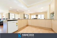  3 Crowd Rd Gelorup WA 6230  $719,000 ULTIMATE LIFESTYLE HAVEN Web property id: 641 Amazing opportunity to secure your ultimate lifestyle dream. Situated on a sprawling 6,700sqm of rural bliss, yet only minutes away from the expanding Dalyellup Shopping Precinct so you get the best of both worlds. A sensational property with monstrous open plan living area, separate theatre room and beautiful added extras such as recessed ceilings, down lights and r/c a/c.  The four bedrooms are a great size with either walk in or built in robes and your guests will enjoy spending the weekend, with the spare bedroom having it’s very own ensuite. All year round you can enjoy entertaining outside under the massive fully enclosed patio. Enclosed with floor to ceiling glass panes you can kick back and enjoy the view of the magnificent gardens, all year round. Additional features include a huge 12m x 12m x 3.6m high shed, bore with filter system, rain water tanks and auto retic system. 