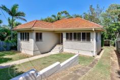  11 Blomfield St Moorooka QLD 4105  $539,000 Beautifully presented, this characteristic, privately set home combines its well-maintained charming features with stylish updates to offer its new owners a modern family lifestyle with easy care, low maintenance living. The homes light filled interiors comprises a spacious contemporary kitchen, comfortable air conditioned living, three bedrooms and beautiful polished timber floors throughout. Set on a generous 612m2 allotment the home boasts a huge backyard, perfect for kids and pets to run and play. Key features of the home include: - Air conditioned living area with ceiling fan - Modern kitchen with stainless steel appliances and 900M gas cooking - Three bedrooms, all with built-in wardrobes and ceiling fans - Well-presented main bathroom with shower-over-bath plus a second toilet - Polished timber floorboards throughout - Solar power recently installed plus a brand new hot water system - Fully fenced 612m2 block with low maintenance gardens - Single undercover car accommodation at the back of the property - Separate laundry and an abundance of storage space underneath the house This fantastic, family friendly location, just 7km from the city, is moments away from local schools, sportsgrounds, parks, shops, public transport and within easy access to main roads taking you on the road to where you need to be in minutes. Perfect for the growing family or first home buyer, this Moorooka gem will not last long. Contact Roger Vogelsang for more information and to arrange your inspection. 3 Bedroom 1 Bathrooms 1 Car 615 m2 of Land (approx) Air Conditioning Fully Fenced 