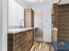  26/56 Speed Street Liverpool NSW 2170 $380,000 - $420,000 By far one of the nicest top floor units Infiniti Property has seen, this property has had a gorgeous interior redevelopment encompassing a modern contemporary style tailored to the needs of any buyer with its low maintenance Italian & Spanish wall and floor tiles to the luscious European kitchen with stainless European appliances. Its location is on par Sydney's best for its centrality, affordability and its guaranteed future growth being the South Western Sydney growth center, the enormous multiple billion dollar upgrade of Liverpool and its immediate surrounding suburbs will pave the way for Liverpool's economic, social and population surge making it the "go-to" area to park your money in. Drawing attention to: + 2 beautiful, good sized bedrooms with brand new mirrored built-ins & good quality hard wearing underlay/carpet + A kitchen to die for, dressed in the latest colours, Made in Europe appliances, built-in oven/microwave with induction cook-top and booster, cabinetry highlighting Blum soft close door/drawer hardware, 40mm engineered stone benches by Quantum Quartz, kitchen comes with a 25 year manufacturers guarantee. + An absolute luscious bathroom, European tiles from floor to ceiling, frame-less shower panel, wall-hung vanity, exhaust fan/LED lighting and exquisite bathroom accessories sure to create that wow factor + Tiled floor to ceiling internal laundry with wall hung 40mm stone bench, polished chrome tap-ware and premium 1/4 turn taps for washing machine + Combined living/dining and kitchen areas with Italian floor board look tiles through-out + Brand new Kresta rubber backed vertical blinds in neutral white, bring your own furniture and don't worry whether it will match the decor, blinds have a 10 year guarantee + Low energy consuming down-lights through-out, save on electricity bills & globes + An addition of a linen press with plenty of storage + Hot water system has an electronic water leak detector that shuts off supply of water in the event of a leak + Brand new sliding door to balcony + 2.5HP Samsung inverter split system air conditioner with very quiet compressor and "follow me" function, plenty of power to cool the unit and provide comfortable living conditions in the Australian summer + Rewired electrical switchboard with RCD and MCB safety switches + Painted & tiled balcony overlooking an exciting yet serene back drop + High speed NBN broadband & Pay/Satellite TV equipped + Large 1.5 car lock-up garage + All this within walking distance to Liverpool station and Liverpool CBD, shopping, schooling and child-care Property details: + Building age: Approximately 35 - 45 years old + Construction: Double brick + Quality of Construction: Good + Total floor space: 80m2 incl. balcony & garage Rent & Levies: + Prospective rental: $370 / week + Strata levies: $470 / quarterly + Council: $260 / quarterly + Water: $170 / quarterly Suburb Information: + Child Care: Minutes walk/drive + Warwick Farm Station: 800m + Liverpool Train Station: 1km + All Saints Catholic Colleges: 450m + Liverpool Boys/Girls High School: 300m + Al Amanah College - 1.8km + Tafe Liverpool - 1km + Liverpool CBD - 500m + UWS Bankstown - 8.2km + Whitlam Leisure Centre - 2.1km + Hart Park - 550m (Basketball Court, gym/exercise set/childrens play sets/areas) + Chipping Norton Lakes - 3km Property Details Bedrooms 		 2 Bathrooms 		 1 Garages 		 1 Floor Area 		 80 m2 