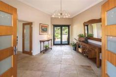  293 Stevens Rd Witchcliffe WA 6286 $1,595,000 Luxurious Estate 4 3 16 15 acre (approx) This magnificent homestead is set on 14 acres of undulating parkland right in the heart of the Margaret River wine region.  The custom designed home makes the most of the north facing aspect and has been thoughtfully planned to make best use of its solar passive aspect. Designed in two living wings with a connecting foyer, the enormous open plan living/kitchen/dining wing comprises a modern well appointed kitchen, expansive sandstone tiled flooring and view capturing doors which open onto the large covered outdoor deck that soaks in the tranquil atmosphere of the landscaped gardens complete with lily pond. Conduct business from home with ease as there is a separate study located adjacent to the entrance door. The bedroom wing is cleverly designed with three double size bedrooms surrounding a second loungeroom that also overlooks the gardens and opens directly onto the north facing verandah. The main bedroom has the indulgence of a walk through robe that leads into a sumptuous ensuite. A second bathroom and separate WC (complete with exterior vanity) is located closer to the remaining bedrooms. Modern stylish tiling, carpeting and fixtures and fittings are evident throughout the entire home and provide a sense of luxury and comfort. If this luxurious home isn't enough for the family, there is a modest cottage located in the valley of the property. Nestled amongst trees, this accommodation would be the ideal pad for the teenager or extended family or rent out to paying tenants, as it consists of a bedroom, open plan living and a bathroom. A spacious elevated deck leading out from the living area overlooks lush lawns and a picturesque spring fed 50m x 40m x 3m deep dam. A large 17.5m x 7.5m powered colourbond shed with concrete floor to two bays is situated between the main house and cottage and provides ample space to store all of the equipment. An area of this shed has been decked out into a games room/living quarters, providing even more space for the kids and extended family. Abutting Leeuwin Estate and neighbouring Voyager Estate wineries, only 9 kilometres from the Margaret River townsite and only 6 kilometres from the coast, live in luxury on the land knowing that the conveniences of town are only a short drive away and the beauty of the region is all at your doorstep. 