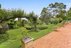  31 Phillip St Burradoo NSW 2576 $1,500,000 FAMILY HOME IN PARK-LIKE SETTING Set amid beautiful gardens on a secluded acre with bore water, this generous family home offers a multitude of light filled living areas. Featuring a large formal sitting room with quaint fireplace and bay windows, there is also an outdoor entertaining terrace affording peaceful views to farmland and the Wingecarribee River. Other highlights are the large family kitchen with gas and electric cooktop while the generous bedrooms have built-ins. In a private cul-de-sac address, this unique home is just minutes from Bowral and Moss Vale. Entrance hall, formal sitting/dining and casual living spaces Master suite boasts walk-in robe and tiled ensuite with a bath Designated reading, media and sewing rooms plus study/home office Separate self-contained flat perfect for guest accommodation Triple garage with garden room, ample storage and internal access Large wine cellar, air conditioning, satellite television dish Council: Approx $1985.59 per annum Water: Approx $2.50 per day + usage Land Area 4,000 m2 PROPERTY TYPE 	 House OFFERS OVER $1,500,000 Floor plan 