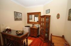  6 Penola St Bundanoon NSW 2578 $649,000 Sitting pretty in Penola This property has it all, character, outlook and space, master suite has its own wing whilst the open plan living looks out to the countryside beyond. The L-shaped home ensures a view from every window. Ducted reverse cycle heating and s/c wood fire Timber floors + 9 ft ceilings Open plan lounge, dining overlooking rear deck Double garage with storage attached by covered walkway Main bedroom with walk in robe, accesses verandah Electric cooking in kitchen with breakfast bar  An easy care block with minimal gardens and some good stands of trees. The deck wraps around the back of the house and is the perfect place to sit, relax and watch the wild life go by... Property: 	 House Bedrooms: 	 4 Bathrooms: 	 2 Parking: 	 2 Land Size: 	 2644 Sqm Council: 	 Wingecarribee 