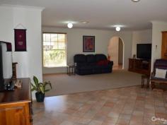  12 Farrer St Parkes NSW 2870 $365,000 SPACIOUS FAMILY LIVING! You'll get an instant welcoming feel when you enter this open planned four(4) bedroom brick veneer home. Just a decade young, this fresh modern home boasts a laid back, stress free lifestyle.  - Main bedroom has walk-in robe & en-suite with built-in robes in the other three.  - Generous open plan kitchen/dining/living zone  - Immaculate family bathroom  - Double lock-up garage with internal access via laundry  - Ducted evaporative a/c & natural gas heating  - Elegant covered entertaining area  - Manicured established gardens & secure backyard  All you need to do is unpack, relax and enjoy!  For more details or to arrange your inspection, contact our eager Sales Team. ID: 349283 Council Rates: $1,863.09 Land Area: 720 m² Zoning: R1 