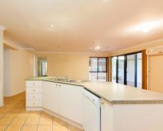  39 Kaboora Cres Westlake QLD 4074  $570,000 DESIGNED FOR FAMILY LIVING Located in one of the most popular areas within the Centenary Suburbs, this stylish and spacious Westlake home is just waiting for you and your family to move in and enjoy. Featuring separate air-conditioned formal and informal living areas, with the kitchen located at the hub, and a large all-weather out-door entertaining area, this is a home designed to suit modern family living.  There are four bedrooms - each with built-in wardrobes - master with air-conditioning and ensuite, in a layout that provides privacy for everyone. Other features include remote double garage with internal entry, security screens and alarm system, and a low-maintenance fully-fenced yard. This fresh and stylish home is yours to enjoy now, so don't delay, arrange your inspection today. Price Buyers Over $570,000 Property ID 2854188  Property Type House Land Size 601 M2 