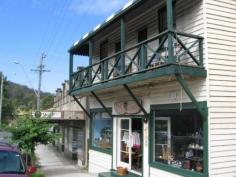  72 Princes Hwy Cobargo NSW 2550     $295,000 	 Positioned in the main street of Cobargo is this historic shop c1895, residence and studio.  The residence features three bedrooms, balcony overlooking Cobargo's main street, bathroom and open fire. The shop is fitted out with good sized kitchen, rear deck for entertaining, large yard and established gardens.  The studio is open plan in a private setting at the rear of the premises. Ideal for a teenage retreat. The shop and residence is ideal for those who are waiting to live and work from home. Tourist traffic ensures there is plenty of passing trade.  Cobargo is a popular stop for the travelers with plenty of curio shops, cafe's, hotel, bakery and news agency. Features Balcony   	 Verandah Property Details Bedrooms 		 3 Bathrooms 		 1 