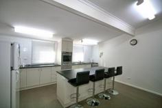  56 Gippsland St Jindabyne NSW 2627 $515,000  A rare find. A master built, centrally located, home with 180 degree lake views. Absolutely nothing to do but move in and enjoy the views. This 4 bedroom, 2 bathroom home sits high on the hill overlooking town and across the lake to Kalkite. All the living areas are upstairs and on one level. 3 good sized bedrooms are serviced by the main bathroom with a separate toilet/powder room adjacent. The huge master bedroom has a wall of built in robes, and an ensuite with a separate toilet. The home is warmed by a slow combustion fireplace which is a centrepiece of the lounge. The spacious lounge/dining area has high ceilings and opens out onto a deck which offers great lake views. The recently renovated kitchen has a walk in pantry, gas cooking and a gas heater. Downstairs the double garage leads into a storeroom which could easily (STCA) be converted into a self contained flat with separate entrance. Alternatively it could be a games/rumpus room or the all important â€œmancaveâ€. A small, easily maintained, established garden at the rear of the house, has room for the dog and the trampoline. Property Details Bedrooms 		 4 Bathrooms 		 2 Garages 		 2 