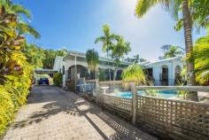  49 Hayles Ave Magnetic Island QLD 4819 OFFERS OVER $580000 ARCADIAN OPPORTUNITYHere is an opportunity to purchase a fabulous family home in the very heart of beautiful Arcadia. Just a short walk to the outstanding Alma Bay and the Arcadia shops, and backing onto national park this 1,368 sqm property offers the astute buyer so much. With 4 very generous bedrooms - open plan layout - cool wide patios all creating the feeling of spaciousness right throughout the home and the kitchen would satisfy any budding chef/entertainer. The master bedroom has an en-suite and huge walk in robe and opens out to its own balcony which overlooks the pool and gardens again giving the feeling of space. The resort like feel of the property lends itself beautifully to the Holiday Rental market. Just imagine yourself and your guests sipping cool drinks on the beautiful patio overlooking the sparkling pool and lush tropical gardens.  The size of the lot and the position of the home affords the opportunity to further develop the property (STCA) - maybe add a parents/guests wing or another small holiday cottage and increase the income potential. This is a home you need to experience and we invite you to do so Property ID: #2956844Price: Offers Over $580000 Property Type: House For SaleLand Size: 1368 M2House Size: -Council Rates: -Water Rates: -Strata Levy: - 