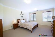  14 Pandorea Street Claremont Meadows NSW 2747 $899,990 OPEN HOME: Saturday 9th January 11:00am - 11:30am House - Property ID: 832257 Very Impressive Located in a new estate and surrounded by quality homes stands this meticulously presented huge family home with outstanding quality inclusions and more than ample room space. Double door entry leads you into a wide hallway with carpet formal lounge are * Open plan dining & family area * Polyurethane kitchen * 20mm granite bench tops * 900mm appliances  * Stainless steel range hood, a kitchen built for any master chef * Rumpus room with combustion fireplace for the cosy family get together * Downstairs toilet and vanity  * 5 double size bedrooms * Combination of walk in and built in robes * Large ensuite to main bedroom * Frame less shower screens * Double corner spa  * Main upstairs bathroom has double vanity & separate toilet * Wide upstairs hallway * Access to balcony with scenic mountain views * Zoned 10hp ducted air conditioning * Sound proof glass to southern facing windows * Manicured gardens * Double garage with one side drive through access * Extensive retainer wall construction * Alfresco dining * Garden shed * Double driveway Call Professionals Outer Western Sydney to find out more today.....  Print Brochure Video Email Alerts Features  Land Size Approx. - 569 m2 