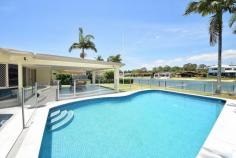  170 Tahiti Ave Palm Beach QLD 4221     $1,375,000 	 On a huge 856m2 block this large family home offers the perfect Gold Coast lifestyle. Clean wide water with a white sandy beach at your doorstep this location is arguably the best residential area in Palm Beach. Many buyers are searching for their next home in Palm beach, so come and make your dreams come true, with options galore and priced right this property will not last long! Featuring: 4 bedrooms 4 living areas 2 bathrooms Fully tiled pool Massive outdoor entertainment 856sqm block Wide water with ocean access Very large kitchen with all the latest appliances Solid stone (granite) tops Dishwasher Air conditioned in main living Fans in all the bedrooms Great bones & loads of potential Security screens and doors Sandy beach (tidal) Great usable flat backyard Now is the perfect time to purchase a value packed waterfront home and live the dream life. If you're looking for a solid family home that has plenty of room for boats caravans trailers jet skis and a pool then this is the right home for you. Property Details Bedrooms 		 4 Bathrooms 		 2 Garages 		 2 