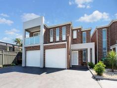  3/7 Beechwood Place Bass Hill NSW 2197 Excellent opportunity for anyone, first home buyer, investor and the growing family, spacious dual level layout with quality finishes, tucked away in a quiet cul de sac street. Main Features:  4 Bedroom all with built ins (main with walk-in robe and en-suite) Polyurethane kitchen with 40mm caesarstone, stainless steel appliances, gas cooking and island bench Spacious bathroom with spa bath and separate shower plus ensuite Large open formal living space, which flows out to a tiled covered alfresco area Separate spacious dining area  High ceilings with designer lighting  Lock-up garage with internal access plus generous storage Daikin Ducted air conditioning throughout Video security Intercom, full house alarm system Internal laundry with a separate third toilet Tiled downstairs with carpet upstairs in bedrooms only Jarrah grain texture timber staircase with Jarrah timber hallway Easy maintained backyard Secured complex only 7 homes in the complex Conveniently located within steps to schools and meters to Bass Hill Plaza, Parks and Transport Inspection is highly recommended,  For further information contact Listing Agent Rabie Chehade on 0409 006 900 Property Details Bedrooms 		 4 Bathrooms 		 2 Garages 		 2 
