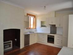  98 Crampton St Wagga Wagga NSW 2650 $480,000 This 1880's home is situated on a 958.4 square meter block of land. It has driveway access on both sides of the home. The front of the home has a northern aspect. * Renovated eat in country kitchen  * Wide cypress floor boards & 3.35m ceilings  * Original fire places retained througout  * Endless potential to make into a substantial home  * Gas heating & Evaporative cooling Inspections Inspections by appointment only. Features General Features Property Type: House Bedrooms: 3 Bathrooms: 2 Land Size: 958 m2 (approx) Indoor Living Areas: 1 Toilets: 2 Floorboards Dishwasher Gas Heating Evaporative Cooling Air Conditioning Open Fireplace Outdoor Secure Parking Carport Spaces: 1 Outdoor Entertaining Area Other Features Close to shops, Close to transport 