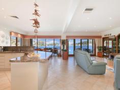  29 Cuttlefish Parade St Huberts Island NSW 2257 $1,850,000 - $1,950,000 The Epitome of Prestige Waterfront Sophistication! House - Property ID: 822389 Secure your own piece of paradise and become a part of this exclusive outside waterfront enclave in one of the area's most prestige addresses. Gazing out over the serene Brisbane Waters with views stretching from Daleys Point to Woy Woy, this architect designed home provides a magical private retreat amid beautifully landscaped grounds. Few residences can offer such an immediate impression of space, quality and family excellence with private onsite boating facilities. It provides absolute seclusion yet is only minutes away from shopping, cafes and schools.  - A grand entry foyer showcases impressive 18 foot ceilings. - Light filled two-level layout designed to highlight the views. - Flowing open living spaces with separate formal and casual areas. - Expansive outdoor entertainment areas enjoying the panoramas. - Upstairs bedrooms include a master with walk-in and spa ensuite. - Gourmet granite kitchen equipped with quality appliances. - Separate office, CCTV, alarm, air conditioning and double garage. - Occupying 743sqm block with landscaped gardens and lawns. - Deep water jetty and pontoon suitable for a large cruiser. Inspection by appointment only. Exclusive Agent Rob Hughes 0421 070 000   Print Brochure Virtual Tour Email Alerts Features  Land Size Approx. - 746 m2  Study  Waterfrontage  Jetty 