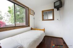  21 Kungala St St Marys NSW 2760 OPEN HOME: Saturday 9th January 9:30am - 10:00am House - Property ID: 824524 Are you paying attention? First time offered for sale in 26 years, this large 2 story, recently renovated home with stylish fixtures and central CBD location.  Within minute's walk to Main Street St Marys, specialty shops, Target and Woolworths shopping mall, Ripples leisure center and St Marys railway station: Now let's work down the list of features: *5 bedrooms, 4 with built-in robes *Study *Loads of storage space *Renovated kitchen with modern appliances, ample cupboard space and granite bench tops *Natural gas cooking and heating *2 large renovated bathrooms *2 sizable living areas * Living and dining room * Downstairs and upstairs timber floors * Brand new upstairs kitchenette * Upstairs bedrooms feature balcony access * Fully fenced * Established front and rear gardens * Ideal location for home business. * Long double garage with high ceiling(3000mm) and automatic doors with access to street and back * Balcony with scenic views * Established fruit tree gardens front and rear yards. You really need to inspect this home.  Print Brochure Email Alerts Features  Study 