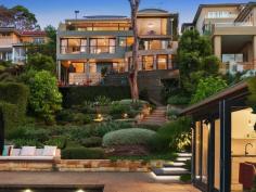  81 Minimbah Rd Northbridge NSW 2063 Elevated above the stunning waters of Sailors Bay, this north facing family home showcases a world class renovation and rare entertaining potential. It is set across a deep waterfront reserve block on Northbridge's finest street, moments from village life. Interiors by Hecker Guthrie, landscaping by Secret Gardens Expansive lounge/dining areas seamlessly flow to the terrace Heated Bisazza mosaic tiled pool/spa, self-contained cabana Italian Bedonia stone kitchen includes Gaggenau appliances Vast rumpus room, private decks embrace northern sunshine Cavelier Bremworth carpeted bedrooms with built/walk-in robes Luxe bathrooms, impressive master, study and versatile loft American oak and polished concrete floors, abundant storage Fully irrigated garden, guesthouse/cabana, Jetmaster fireplace Internal access double garage plus extra off street parking FEATURES Built-in Robes Balcony Internal Laundry Dishwasher Fireplace Swimming Pool Fenced Foxtel Spa Deck 5 Beds 4 Baths 2 Cars Elevated above the stunning waters of Sailors Bay, this north facing family home showcases a world class renovation and rare entertaining potential. It is set across a deep waterfront reserve block on Northbridge's finest street, moments from village life. Interiors by Hecker Guthrie, landscaping by Secret Gardens Expansive lounge/dining areas seamlessly flow to the terrace Heated Bisazza mosaic tiled pool/spa, self-contained cabana Italian Bedonia stone kitchen includes Gaggenau appliances Vast rumpus room, private decks embrace northern sunshine Cavelier Bremworth carpeted bedrooms with built/walk-in robes Luxe bathrooms, impressive master, study and versatile loft American oak and polished concrete floors, abundant storage Fully irrigated garden, guesthouse/cabana, Jetmaster fireplace Internal access double garage plus extra off street parking FEATURES Built-in Robes Balcony Internal Laundry Dishwasher Fireplace Swimming Pool Fenced Foxtel Spa Deck   UPCOMING INSPECTIONS Saturday 5 December 10.00am - 10.30am Saturday 12 December 10.00am - 10.30am SALE METHOD Private Treaty 