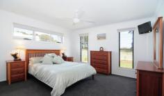  4 Seagrass Avenue Vincentia NSW 2540 $665,000 ULTIMATE STYLE - TREAT YOURSELF Modern contemporary design with inspiration drawn from the relaxed coastal lifestyle and the ambiance of the surrounding native bushland. Located within 1-3 minutes of schools, sporting fields, leisure centre, medical services, new Woolworth's shopping complex and most importantly Jervis Bay's pristine beaches. Architectural in design, quality construction. Stunning polished timber floors throughout. Beautiful granite kitchen with butler's pantry. Seamless flow from kitchen to dining & living. Media/2nd living opens to the alfresco diner. King size beds all with BIR and ceiling fans. Master suite with generous high end ensuite, walk in robe that most only get to dream of and office where you could work from home. Double garage with handy single drive through. Sits prominently on a large 598m2 corner block.   This home has been thoughtfully designed and meticulously constructed. There have been no expenses spared and no corners were cut, offering the best finishes to suit the style and location. 