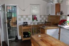  46 Tenterfield St Deepwater NSW 2371 $155,000 HISTORIC VILLAGE RESIDENCE * 140 year old residence  * Brand new roof and recently painted inside and outside * Lots of original features - open fire places with original mantle pieces * 2 wood heaters * Updated kitchen and bathroom * Adjoining 1 bedroom self contained granny flat * Large 2023m2(1/2 Acre) block of land PLUS SELF CONTAINED GRANNY FLAT $155,000 Bedrooms 	 4 Bathrooms 	 2 Garage 	 0 Carports 	 2 Flooring 	 Land Content 	 Land Size 	 2023 Square Mtr approx. Units in Complex 