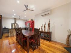  44 Daldawa Terrace Lyons NT 0810 $950,000 This magnificent executive residence situated in the sought after suburb of Lyons will surpass all your expectations if you are after a large family home that offers the finest in quality and ingenuity of design and functionality. When you pull up in front you will be impressed however when you step inside you will be awestruck. This elevated four bedroom, three bathroom tropical residence is the complete package. Not surprisingly It has won multiple accolades - (2011 HIA Winner Custom Built House; 2011 HIA Tropical Home; 2011 Master Builders Association Winner Individual Contract Home of the Year). As you walk in the front door and make your way up the extra wide staircase featuring Kwila treads imported from Indonesia with Zenolite risers you will be amazed at the vast living area. The generous yet separate living and dining areas feature highly polished Tasmanian Oak floors and flow seamlessly into each other. The striking 2-pac kitchen boasts an abundance of storage space, soft close drawers, granite bench tops, gas cooking, stainless steel splash back, quality appliances and provides easy access to the expansive rear balcony. You will want to spend time here. When it comes to dining, you?re spoilt for choice. Your options include a huge, impressive rear deck which looks out over the neatly laid out, landscaped tropical back yard. The vista also encompasses the sparkling waters of a designer in ground pool, complete with spa and waterfall. The pool also lights up at night should you decide on an evening dip. Perhaps you?d prefer the front deck which provides ample space, cover and a leafy, green outlook courtesy of the tree lined boundary which camouflages the rear of RDH. A perfect place to relax and watch the sunset. At the end of a relaxing afternoon unwind further in your amazing master bedroom ? this has truly been escalated to a totally different level. It is easily described as immense and includes such comforts as a generous built in robe as well as an ample walk in robe, split system A/C?s at either end. The bedrooms en suite is also in a class of its own, featuring a double wash basin set into a floating vanity, a huge shower recess with dual shower heads and taps, louvered windows for ventilation and room to move. The main bathroom is fitted with a nice sized corner tub for those times when you just want to sink into some bubbles and let the cares of the day drift away. This room is complimented also by the separate shower with slim line glass panel recess, the room boasts frosted louvers for ventilation. Additional benefits include a large approximately 4m x 5m rumpus room/5th bedroom downstairs as well as a downstairs tropical style bathroom ? prefect for a shower straight after a dip in the pool, an undercover entertainment area and storeroom and a beautiful tropical garden and enough private yard space for the children to play safely.  This home has High speed data connected through Telstra smart community as well as having NBN connected. This home epitomises the best of tropical living, complimented with the decadence of modern comforts in a sought after location - just a stone?s throw from Casuarina shopping Centre, Royal Darwin Hospital and the stunning Casuarina Coastal Reserve. These kinds of quality family homes are in demand, but not often found. Inspections Inspections by appointment only. Features General Features Property Type: House Bedrooms: 4 Bathrooms: 3 Indoor Ensuite: 1 Toilets: 3 Alarm System Floorboards Broadband Internet Available Built in Wardrobes Dishwasher Rumpus Room Split system Air Conditioning Outdoor Carport Spaces: 2 Balcony Outdoor Entertaining Area Swimming Pool - Inground Eco-friendly Solar Hot Water 
