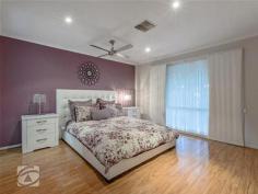  13 Peppermint Cl Greenwith SA 5125 $530-550,000 Located in heart of Petworth Lakes, this spacious Family Home has three separate living areas with views of rolling hills and glorious sunrises. Four Bedroom home, double doors leading to main bedroom, walk in robe, ensuite consisting his and hers vanity unit, plus two person spa. Bay window formal lounge/dining with vaulted ceilings. Large kitchen providing ample bench/cupboard space and walk in pantry. Light bright family room and casual meals opens to separate games room via double doors. Both family and games room have sliding doors leading to verandah entertaining area and low maintenance gardens. Bed two and three are both double bedrooms with built in robes to bed three and four.  Neutral decor, down lights, high gloss floating floors and new carpet give home wow factor. Ducted reverse cycle air conditioning provides all year comfort plus Solar Panels. Located in one of Petworth Lakes best streets surrounded by other quality homes with reserve/playground and Duck filled lake a short stroll. Woolworths, Chemmart, BWS and specialty stores at trendy recently completed The Stables Shopping centre. Greenwith and Our Lady of Hope primary school/kindergarten are all conveniently located close by. Additional information Property Type House  Property ID 11115117533  Street Address 13 Peppermint Close  Suburb Greenwith  Postcode 5125  Price $530-550,000  Council Zoning GGR  Living Area 247 sqm (approx)  Land Area 603 sqm (approx) 