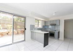  2/30 Carmarthen Circuit Pacific Pines QLD 4211 $325,000 Trendy Modern Townhouse! As new, nothing to do! This terrific 3 bedroom plus ensuite townhouse is spacious, modern, immaculate and presents like brand new! Features fully tiled open plan living, private courtyard, end unit position giving added privacy, lock-up garage, community pool, gym and a secure gated complex, located just minutes to schools, parks and Westfield shopping centre! Three bedrooms Ensuite, walk-in robe and balcony to main bedroom Fully tiled open plan tiled living Lovely modern kitchen with stainless steel appliances and dishwasher Air conditioning Private fenced courtyard with covered patio area Lock-up garage Resort pool and gym in secure complex Currently tenanted till June 16 at $385pw Superb Investment Opportunity! Property Features Air Conditioning • Balcony • Built-ins • Courtyard • Dishwasher • Entertainment Area • Gym • Investment Property • Modern Kitchen • Secure Parking • Swimming/Lap Pool • Walk in robe 