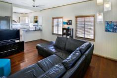  81 Goodwin St Currajong QLD 4812 $305,000 Great Beginnings Priced to suit the market this renovated, 1950s, tongue in groove, low-set timber cottage, has an urban charisma. You can move straight in, there is nothing to do. Offering polished floors throughout, fans and air-conditioning, and also a covered back porch, a great place to relax and unwind for those looking for easy living. This property is a fully fenced 809sqm; for your young children to play unheeded and room for the family pet.  Enjoy a contemporary lifestyle with a fantastic central location and minutes from the CBD; this is convenient inner town living with a perfect balance between lifestyle and business. With real estate trends indicating a growing confidence in this area supported by a noticeable price rise for similar properties; homebuyers are searching for affordable properties where the market will meet any improvements they make.  This property offers the opportunity to value-add by adding an extension in years to come to accommodate a growing family. Increase the number of rooms and add a deck with confidence that you have made a wise investment. Please call or text Katya on 0414 444 711 or email: katya.louca@elderstsv.com.au to arrange a private inspection. Other features: Built-In Wardrobes,Close to Schools,Close to Shops,Close to Transport,Garden,Garden shed Property Details Elders Property ID: 9157715 2 bedrooms 1 bathrooms 1 car parks Land Area 809 square metres Single garage Air Conditioning 