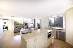  104 Hugh McKay Cres Dunlop ACT 2615 With a View to the Future! Auction to be held on Wednesday 16th March 2016 at 6:00pm, at LJ Hooker Canberra City, 182-200 City Walk. Whether you are starting your property portfolio or looking for the forever home, this one is a must see. Located in a sought after pocket of Dunlop, this property will make you feel at home from the moment you drive in your driveway! On an elevated corner position with views over the Brindabella's, you can sit back, relax and watch the sunset from your expansive entertaining deck.  The 3 bedroom floor plan has been converted into a 2 bedroom, 2 living area home. So you have the option of keeping the current floor plan or easily convert back to the 3 bedroom layout. Either way you will love the open plan kitchen and living design and the outlook onto the easy care gardens. The plants are established to maximize privacy but not have you in the garden every weekend.  Inside is beautifully presented with floating floors, a gas fireplace with ornate surroundings and evaporative cooling for the summer months! There is even a spa bath for unwinding in (after you have enjoyed the sunset from your deck and a glass of wine in front of your fire!), what more could you want?! How about motivated vendors and the fact that it is currently tenanted by fantastic house proud tenants, you can let them look after your home until you are ready to move in! Or talk to me about your moving timeframes. This home is a beautiful mix of class, style, easy care and of course luxury lifestyle, without breaking the budget! This property is unlike anything else on the market, so call today to inspect, you won't regret it!   Property Snapshot  Property Type: House Land Area: 366.20 m2 Features: Study Ducted EER: 4.5 