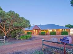  2 Bevan Loop Roelands WA 6226 $649,000 - $695,000 Memories Forever Lifestyle is what many buyers look for and this property in the heart of Roeland's, only minutes from the new Shopping Centre and local amenities certainly fulfills its role as being a true lifestyle home.  Inside the home, a well thought out floor plan compliments a functional and tastefully fitted out design, complete with modern fittings for easy living, it also seamlessly flows into the outdoors creating simplicity and space.  The large family area is warmed cozily in the winter months by the slow combustion stove and provides for a place of relaxation and family time.  The jarrah double doors lead onto the stunning custom paved pool area which will become your space in the summer months when it's time to cool off or to find a sun bed in the shade to read a book.  The absolute delight of being able to enter your own entertaining domain is amazing with the custom built large gabled room, finished with exposed aggregate floors, full power, lighting and plumbing with a sink.  Outside is a fire-pit and sheltered bbq area. Definitely the place to cook the finest rib-eye under the stars whilst your guests enjoy a moment at the bar.  With a large double door shed for vehicles and adjoining workshop, assorted fruit trees, native plants and large gum trees this beautifully presented property will fulfill all your dreams to create perfect memories.  Some of the included features are;  Large zoned reverse cycle air conditioning  Alarm with full monitor feature  Approx 10m x 5m Salt water pool  Bore with submersible pump  Property fully reticulated  9x12m powered shed  7x12m undercover hardstand  Huge 9x12m games room  Instant gas hot water  Landscaped and easy care gardens  Plus lots more..  For your chance to live this dream ring Clint today!  PROPERTY DETAILS $649,000 - $695,000 ID: 360499 Land Area: 4078 m² 
