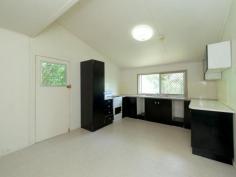  26 Delacy St North Ipswich QLD 4305 $250,000 Cute cottage situated on a large 1012m2 block! Upstairs you will find two generous sized bedrooms, tidy bathroom & toilet and spacious lounge room with access to the beautiful timber front deck. Neat and tidy dine in kitchen with plenty of cupboard space & electric stove.  Downstairs is complete with kitchenette, second shower & toilet, built in laundry and space for a rumpus room.  Single free standing carport to the front of the property. Large backyard with ample room for a shed. Timber fenced yard with side and rear access, plenty of room for a caravan/boat.  Close to Riverlink shopping centre, medical centre, public transport and local primary and high schools. Quick and easy access to the motorway. Property Details Elders Property ID: 9387704 2 bedrooms 1 bathrooms 1 car parks Land Area 1012 square metres Single garage 